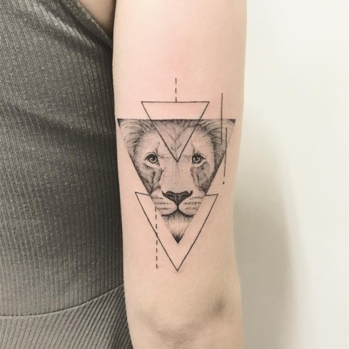 Tattoo tagged with: animal, geometric, triangle, lion, arm 