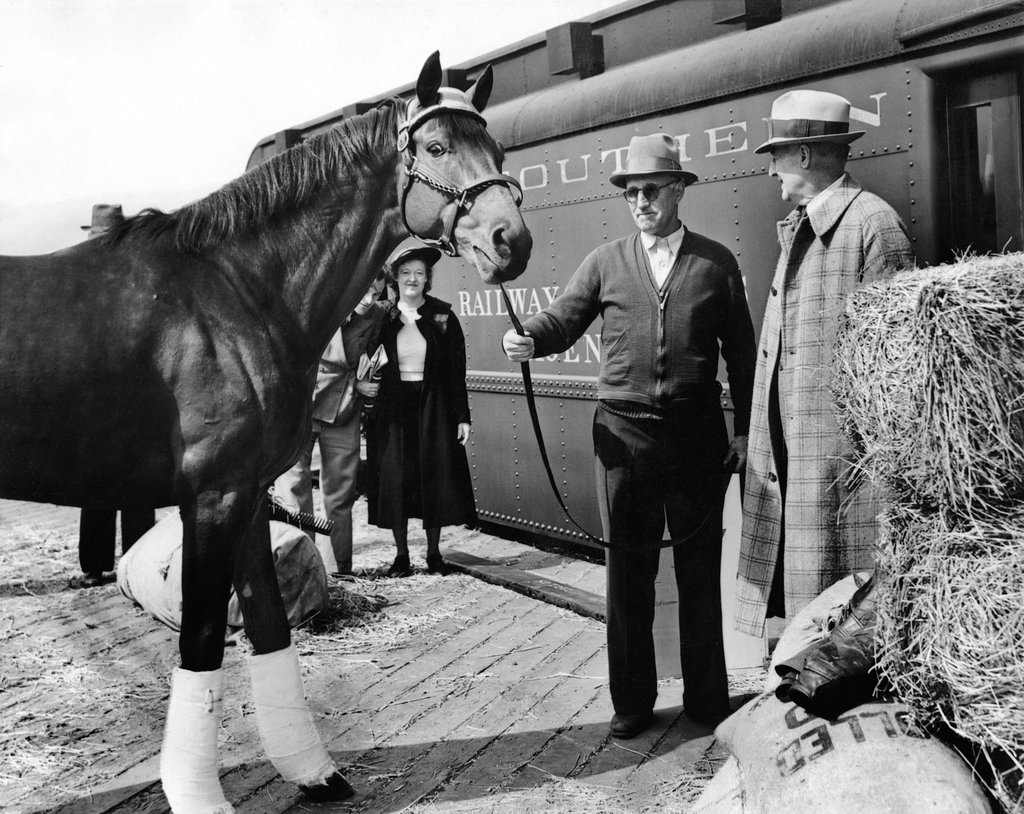 April 22, 1938: The original Seabiscuit, with his trainer Tom Smith.