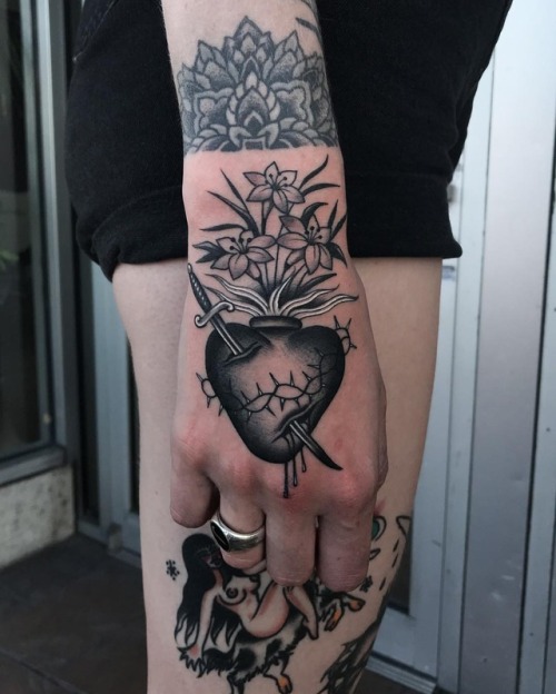 Javier Betancourt flower;dagger;fire;dots;hand;line;blackw;heart;mandala;wrist