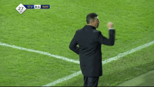 Glasgow Rangers manager celebrating a goal