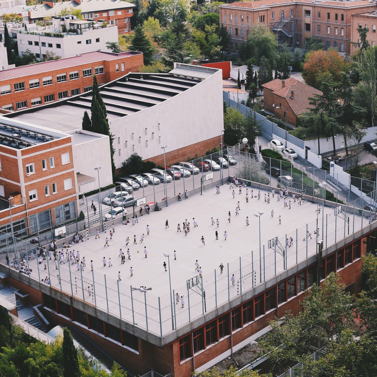 Uncovering the Game in Madrid Just a couple hundred meters from the Santiago Bernabéu, there are a hundred little Madrileños playing on a rooftop. A bell rings every 20 minutes. Each time, the pitch empties for a moment, only to be filled by another...