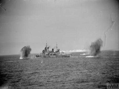 hms-exeter - British light cruiser HMS Glasgow under fire from...