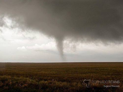tornadotitans - A small, wispy #tornado moves over grasslands...