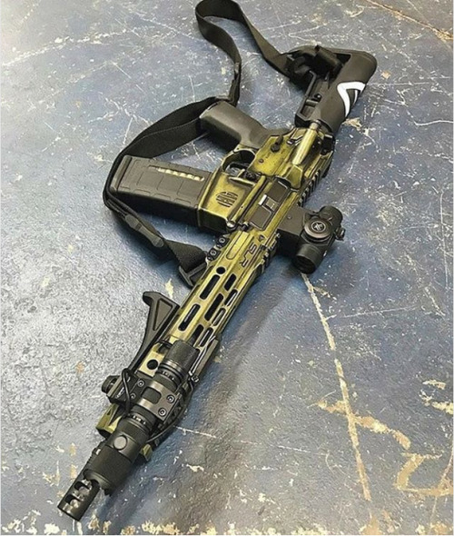 tacticalsquad:from @slrrifleworks - Ion Hybrid handguard on...