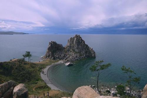 thebeautifuloutdoors - Lake Baikal and Shamanka Rock in Russia....