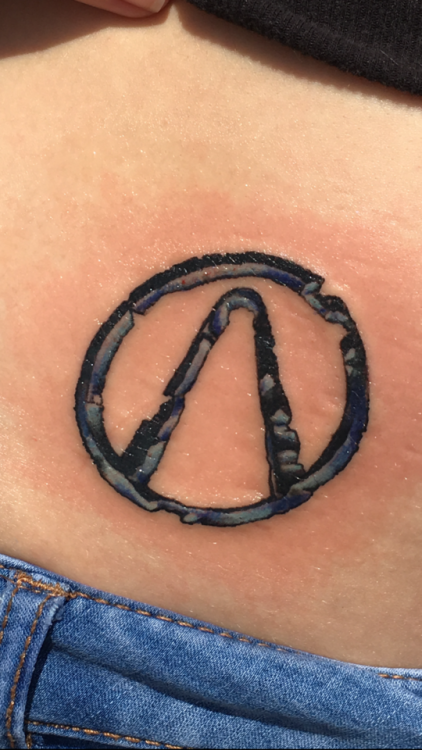 Vault symbol tattoo