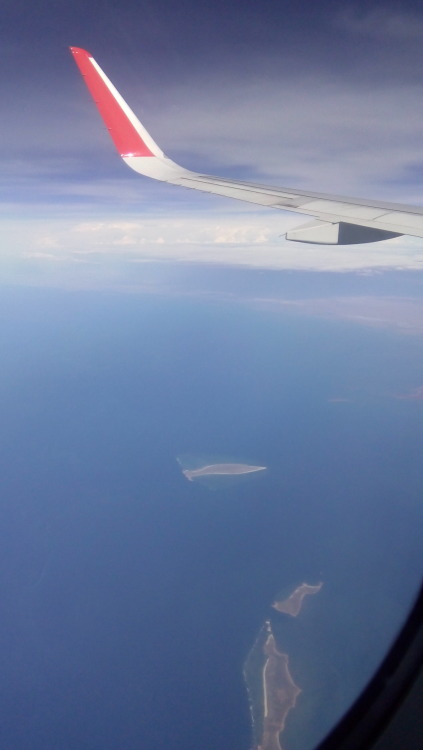 The first Australian islands seen above the plane from Bali