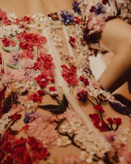 stopdropandvogue - A 3D hand-embroidered floral dress backstage...