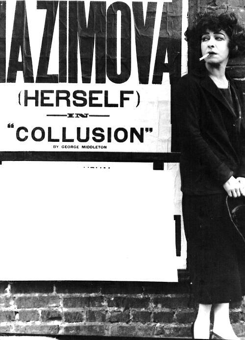 madivinecomedie - Alla Nazimova standing next to poster for...