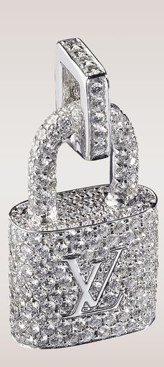 FOR THE LOVE OF JEWELRY — Louis Vuitton Diamond & White Gold Padlock...