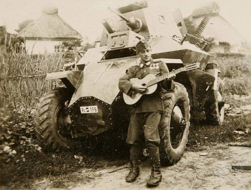 bmashine - Hungarian soldier with a guitar on the background of an...