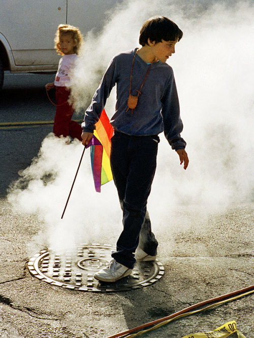 funkpunkandroll84 - Boy holding a pride flag at a LGBT pride...