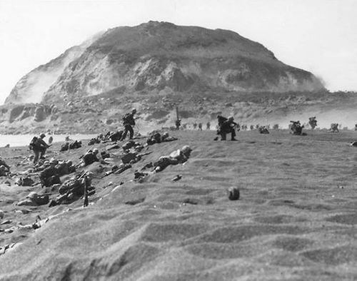 warhistoryonline - Fifth Division Marines moving inland off the...