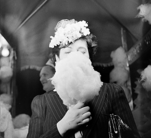 24hoursinthelifeofawoman - “UNKNOWN WOMAN EATING COTTON CANDY”...