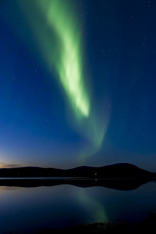 Aurora Borealis reflecting from Lake Äkäslompolo, Kolari,...