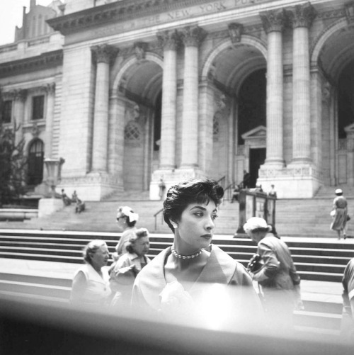 wehadfacesthen - Woman in front of the New York Public Library,...