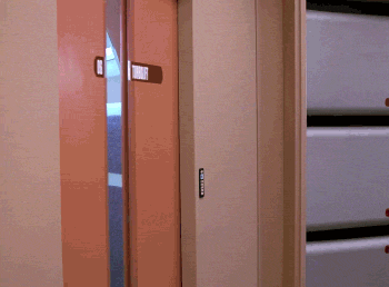 Animated GIF: a door slides open and Captain Picard emerges hesitantly