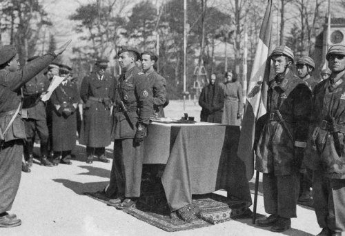 Italian Paratroopers taking the oath of loyalty to the Duce and...