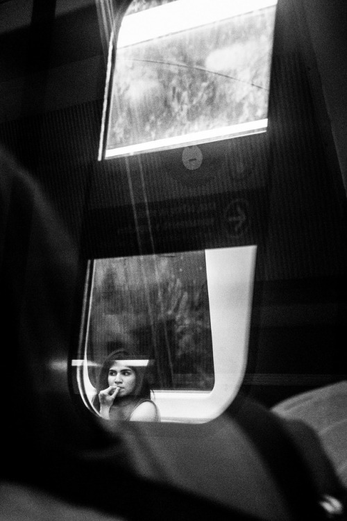 semioticapocalypse - CaOS @ Flickr. Woman behind the window. Rio...