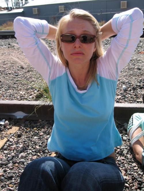 Jill and Suzette tied up on the railroad tracks
