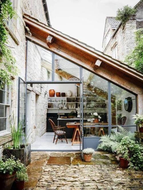 interior-design-home:Kitchen and eating area, framed by a...