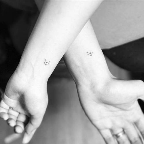 By Jay Shin, done at Black Fish Tattoo, Manhattan.... small;best friend;matching;matching tattoos for couples;micro;symbols;kenaz;ifttt;little;rune;wrist;minimalist;tiny;couple;letter;nordic symbol;fine line;jayshin;matching tattoos for best friends;line art;love