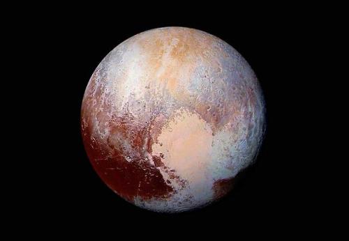 photos-of-space - Pluto, the Former Ninth Planet from the Sun...