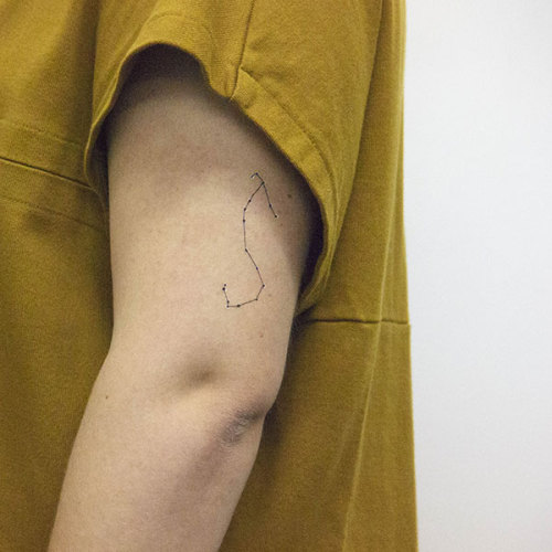 Scorpius constellation temporary tattoo on the left upper arm....