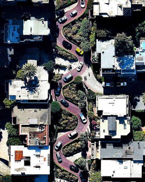dailyoverview - Cars wind down the hill of Lombard Street, which...