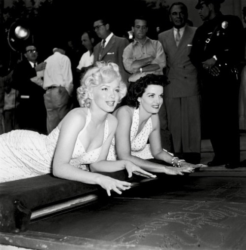 summers-in-hollywood:Marilyn Monroe and Jane Russell leaving...
