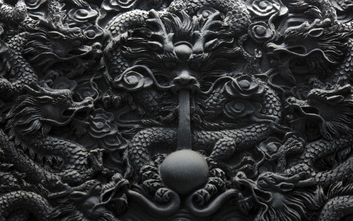 catching-souls-flights - Chinese carving depicting a dragon,...