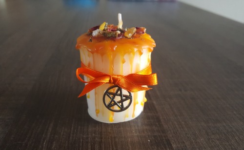 baduhennasraven - How I make spellcandlesI was making a spell candle for the Imbolc ritual I’m..