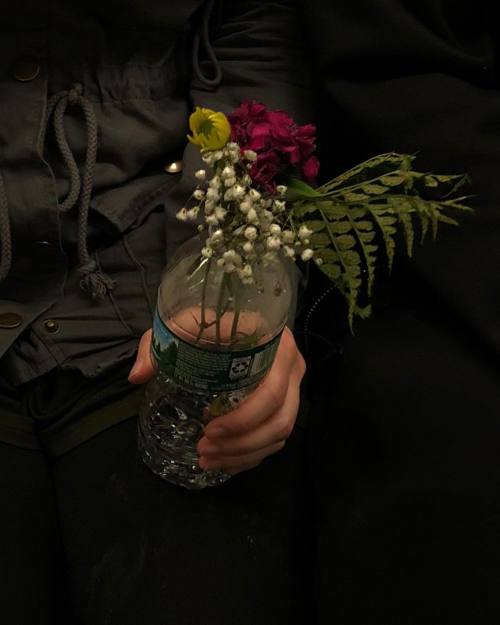 distantvoices:Hands holding flowers by @subwayhands on Instagram