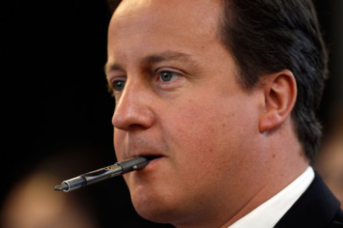 David Cameron desperately tries to suck the ink out of his pen...