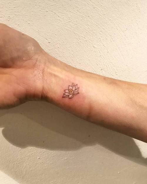 Tattoo tagged with: flower, small, lotus flower, micro, tiny, hand poked,  ifttt, little, nature, wrist, hindu, religious, naraishikawa 