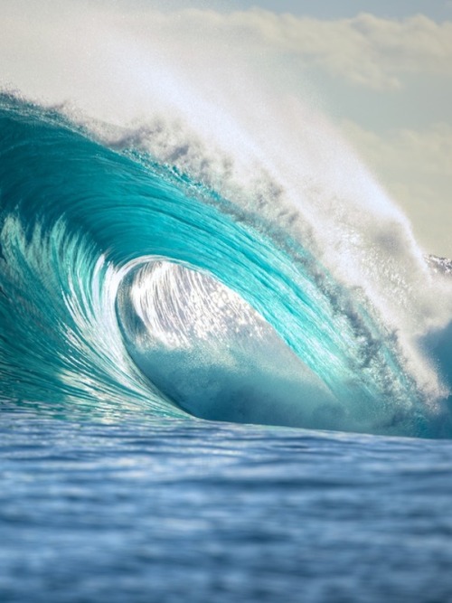 surfsouthafrica - Blue waves in Tahiti. Photo - Tim McKenna