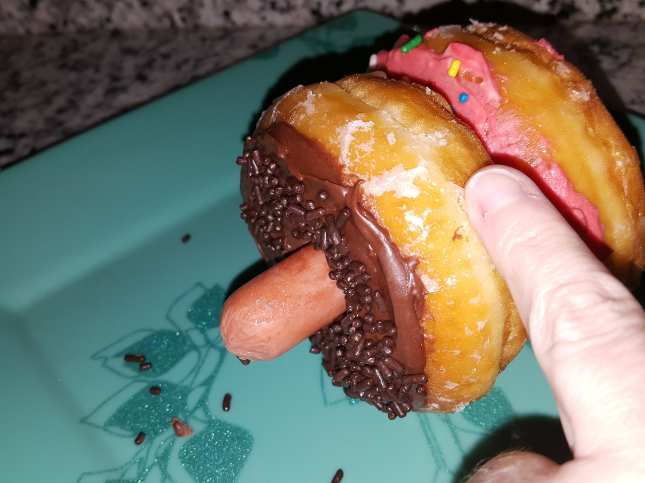 The Dog-NutYou probably don’t need specific instructions on how to make a Dog-Nut, but this photoset features store-bought donuts, Morningstar veggie dogs, and homemade chocolate and vanilla icing! I...