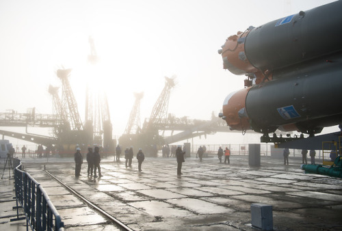 Space Station Bound! - Workers are seen on the launch pad as the...