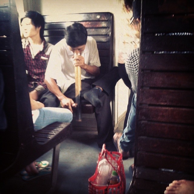 Nothing wrong with a little bong hit on the train to Hanoi… Until 30 minutes later when he threw up into a 5 gallon pail of various drinks some poor guy was trying to sell. (at Hanoi, Vietnam)