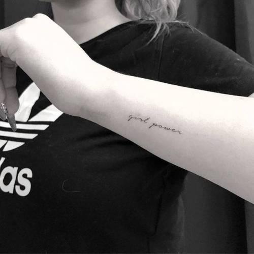 By Evan Kim, done in Manhattan. http://ttoo.co/p/33177 feminist;small;line art;languages;tiny;girl power;ifttt;little;evankim;wrist;english;quotes;other;english tattoo quotes;fine line