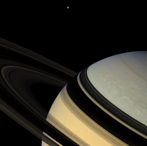 humanoidhistory:Magnificent Saturn and its moon Dione, observed...
