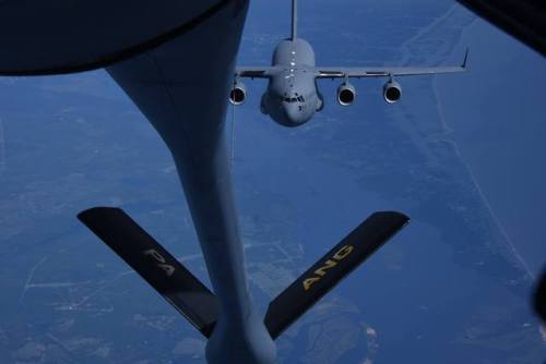 planesawesome - A C-17 “Globemaster" trails a KC-135...