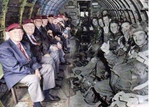 harvestheart - World War II paratroopers shown sitting across...