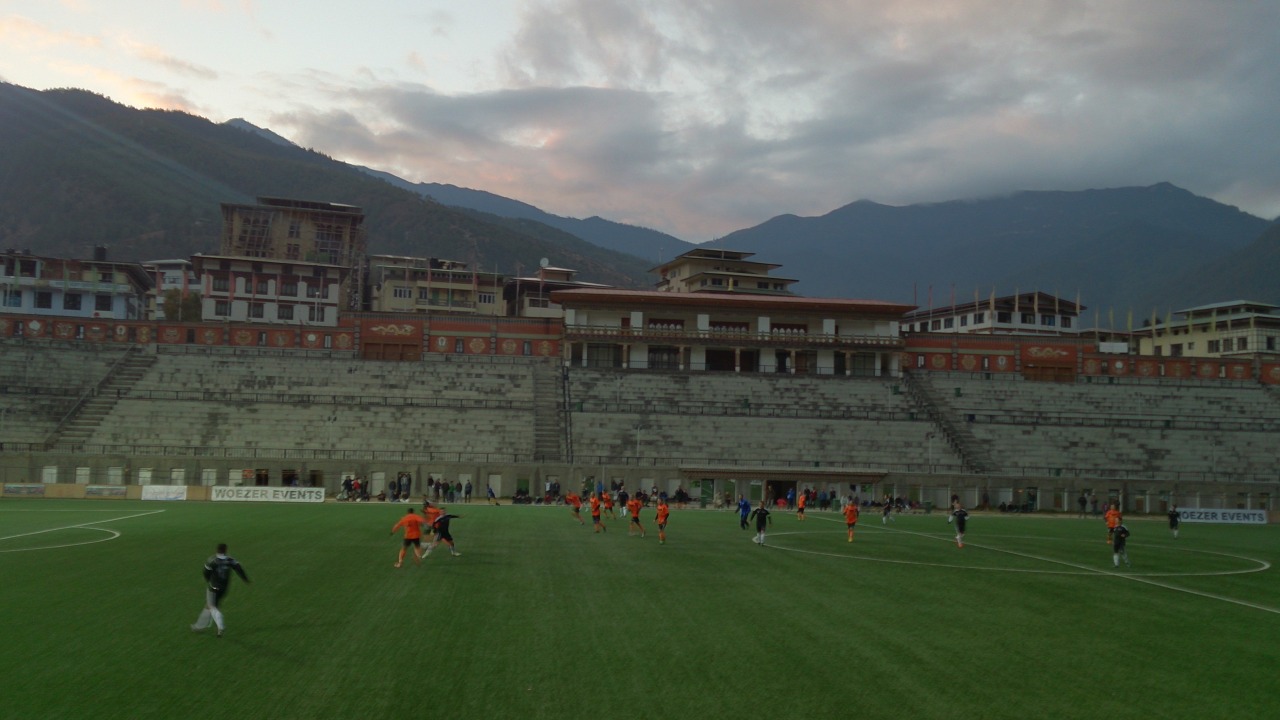 Kicking in the mountains of Bhutan: Changlimethang Stadium [[MORE]]
One of AFR’s most ardent supporters, Yeji Hyun, was at the stadium to watch a final between two veteran clubs: Zimdra FC and Thimphu XI Police. While originally from South Korea,...