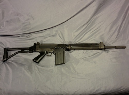 cdn-apex-predator:recoil-operated:the-at-symbol:recoil-operated:the-at-symbol:Gun...
