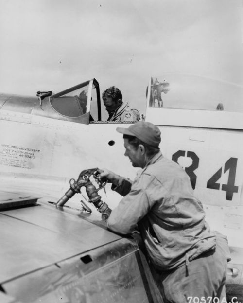 vinegarjoe - USAAF Capt Arthur Bridge sitting in the cockpit of...