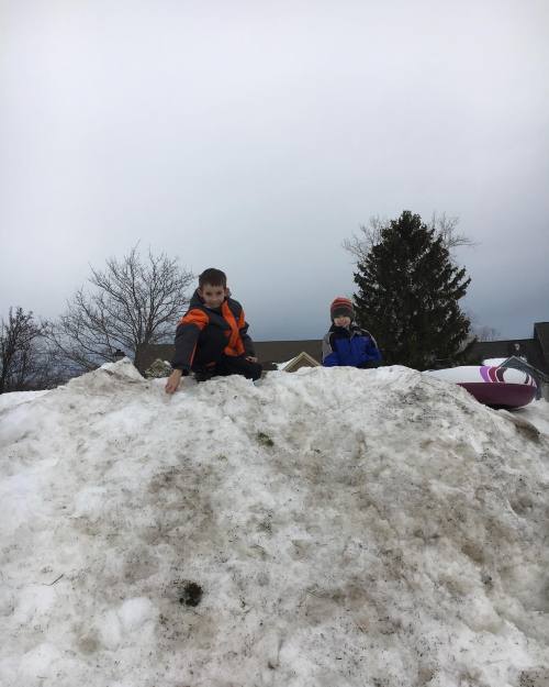 Perks of living on a cul de sac. Giant snow hill to play on. On...