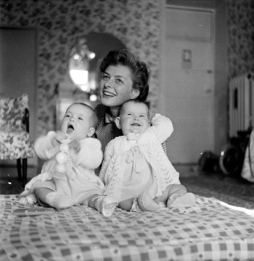 olga-4711 - Ingrid Bergman sits with her then 11-month-old...