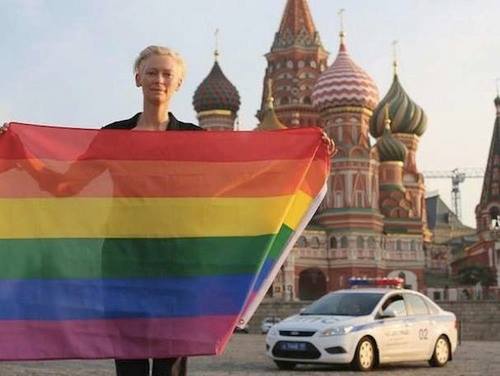 sandboytx:Tilda Swinton risked arrest waving a rainbow flag...