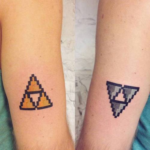 By Numi, done at LTW Tattoo Studio, Barcelona.... numi;legend of zelda;small;symbols;tricep;contemporary;triforce;facebook;twitter;video game;pixelated;experimental;game;other